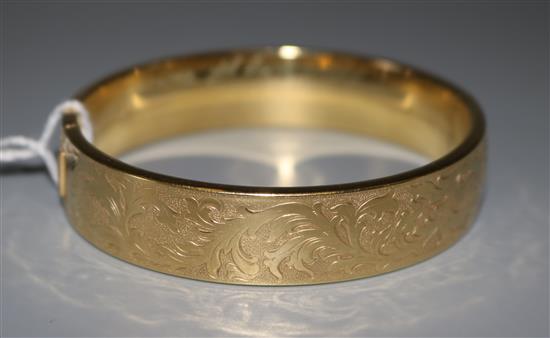 Gold hinged bangle